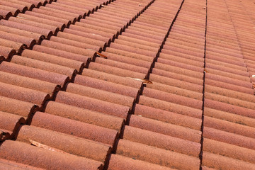 brown tile roof weathered on building residential