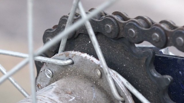 Bicycle gear and chain spinning, macro footage