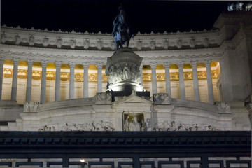 Fototapeta na wymiar Architectural close up at night of Vittorio Emanuele II equestrian statue and its monument in Rome at night