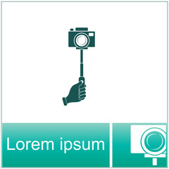 Monopod camera with hand vector icon.