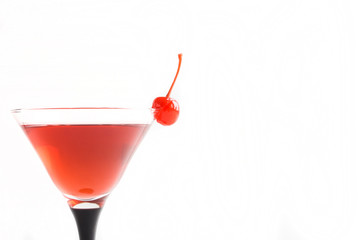 Cocktail in martini glass isolated on white background