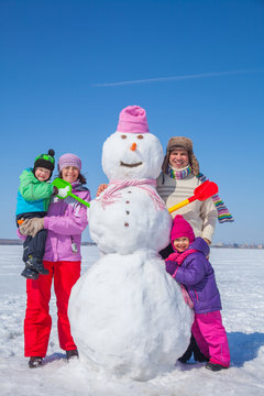 Happy family in winter
