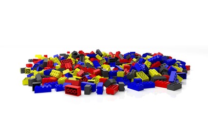 Fototapeta premium Stos kolorowych klocków lego, na białym tle.