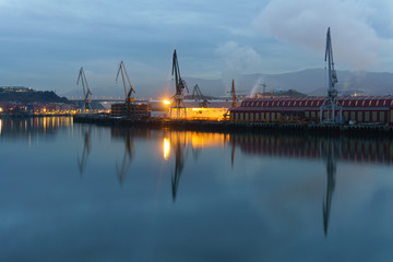 Fototapeta premium Sestao cranes from Erandio at night