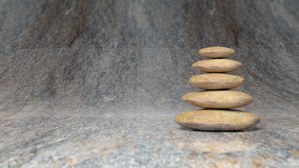 Fototapeta na wymiar Balancing Zen stones stack from large to small on stone surface.