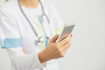 Nurse with phone in her hand 