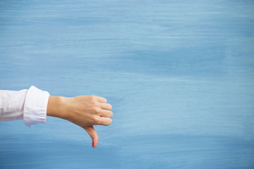 Person showing thumbs down 