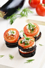 Eggplant with tomatoes and curd cheese