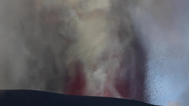 Volcano eruption. Mount Etna erupting from the crater Voragine. 