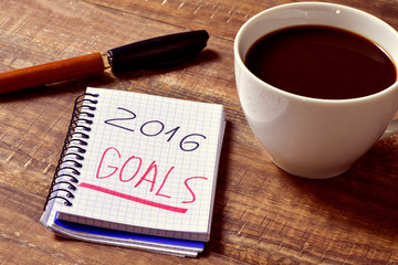coffee and notepad with the text 2016 goals