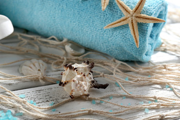 Marine style spa composition on wooden background