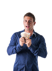 Young man holding two bank notes 