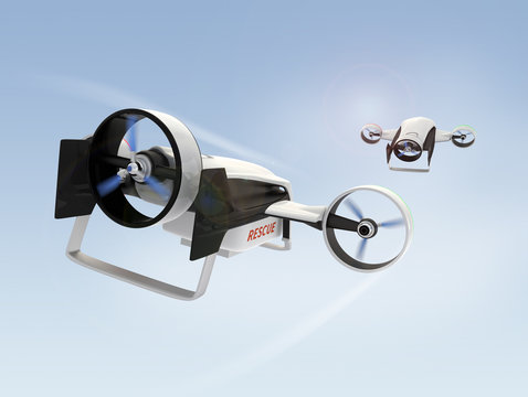 Two hybrid drones flying in the sky for rescue mission