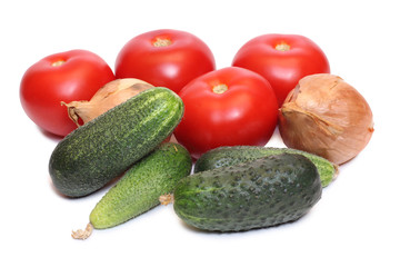 Green cucumber and red tomatos on white background