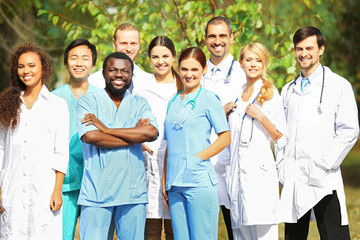 Smiling medics team, outdoors