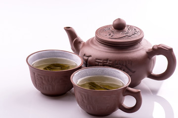 Green Tea set, bamboo mat on white background