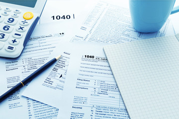 Income tax return form on work table