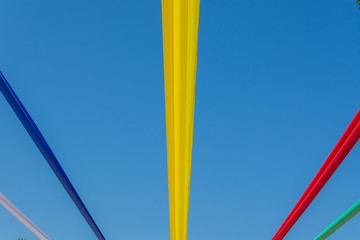 colorful festive fabric against a blue sky background