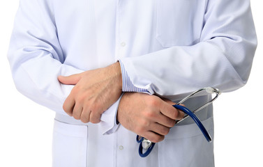 Doctor with crossed hands and stethoscope isolated on white background, close up