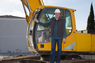 Construction safety concept, close-up worker holding helmet with crane in the background