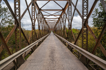 Fototapeta na wymiar Steel Bridge over Varzea River - Campo do Tenente city - PR - Br