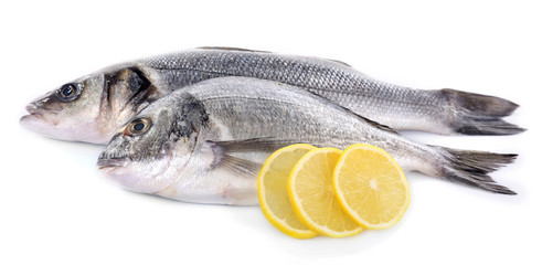 Fresh fish with lemon isolated on white background