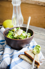 healthy vegetable salad with broccoli, cauliflower, avocados, pu