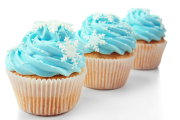 Blue cupcakes isolated on white