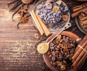 Coffee beans, chocolate drops, vanilla pods, cinnamon sticks, anise stars and brown sugar