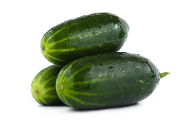 three cucumbers on white background
