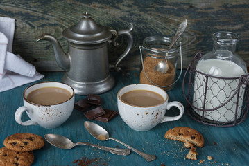 Coffee with milk and homemade oatmeal cookies