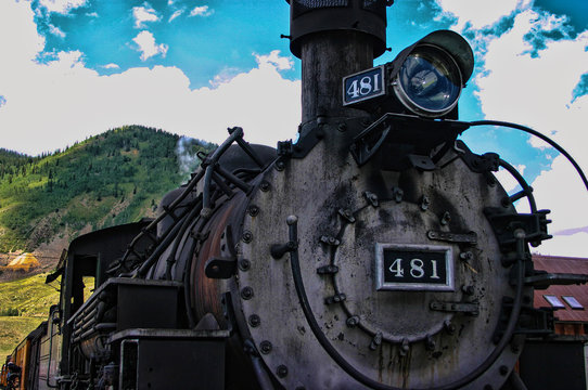 Train Steam Engine and Mountains