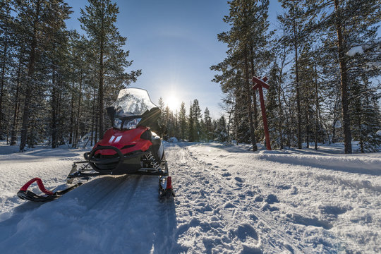 Snowmobile in snowy field