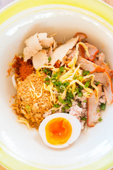 Asian red pork noodle with egg soup