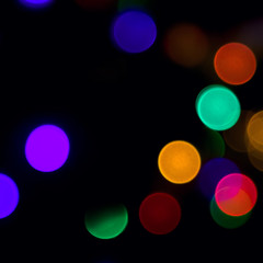 Abstract blurred background of Christmas lights and garlands.