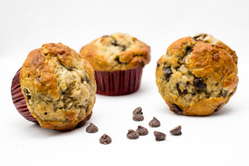 chocolate chips muffins on a white background