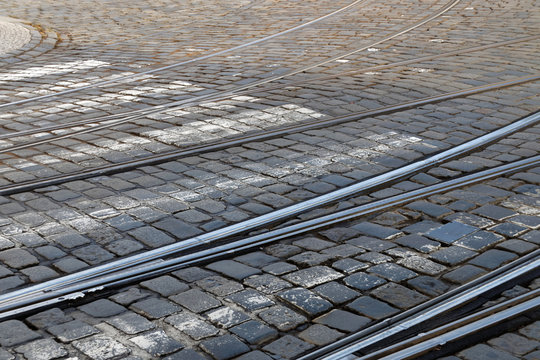 Railway track on a cobblestone street