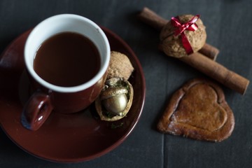 coffee, gingerbread and gift in walnut