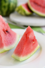 Sliced watermelon on plate closeup