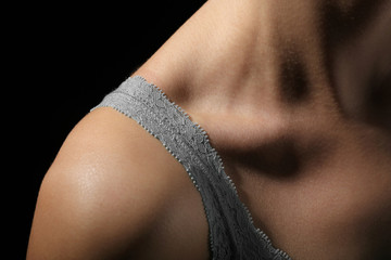 View on woman's neck, collarbone and shoulder, close-up