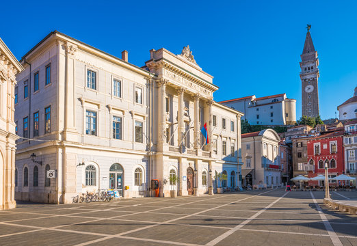 Saint George Church and Town Hall on Tartini Square in Piran Old Town, Slovenia on a Hot Summer Day with Clear Blue Sky