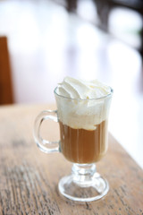 Iced coffee on table in cafe