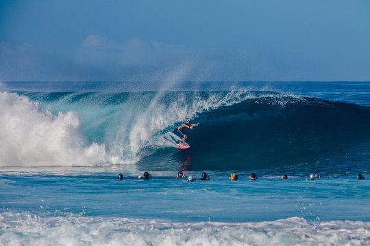 Surfing Waves At Bonzai Pipeline On Oahu's North Shore In Hawaii