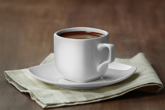 Cup of cacao on napkin
