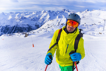 Fototapeta na wymiar Skier man in winter mountains