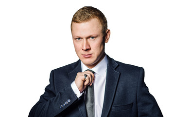 Fashionable businessman preparing his tie isolated over white