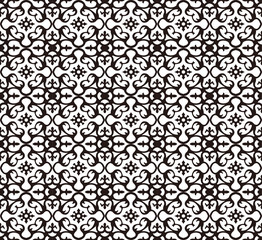 Seamless background image of vintage black white spiral kaleidoscope flower pattern.
