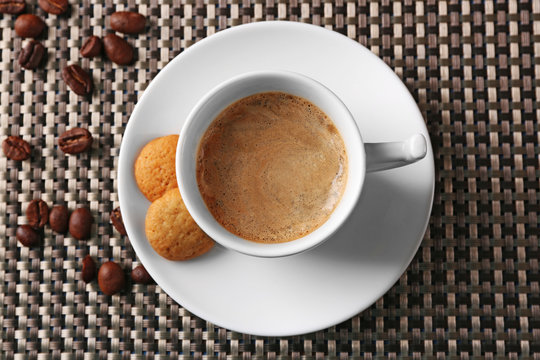 Cup of coffee on dark background