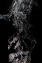 Abstract Smoke from rebuildable drip atomizer (RDA) on a black color background