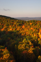 An aerial view of a hot air balloon floating over the Vermont country side ..
